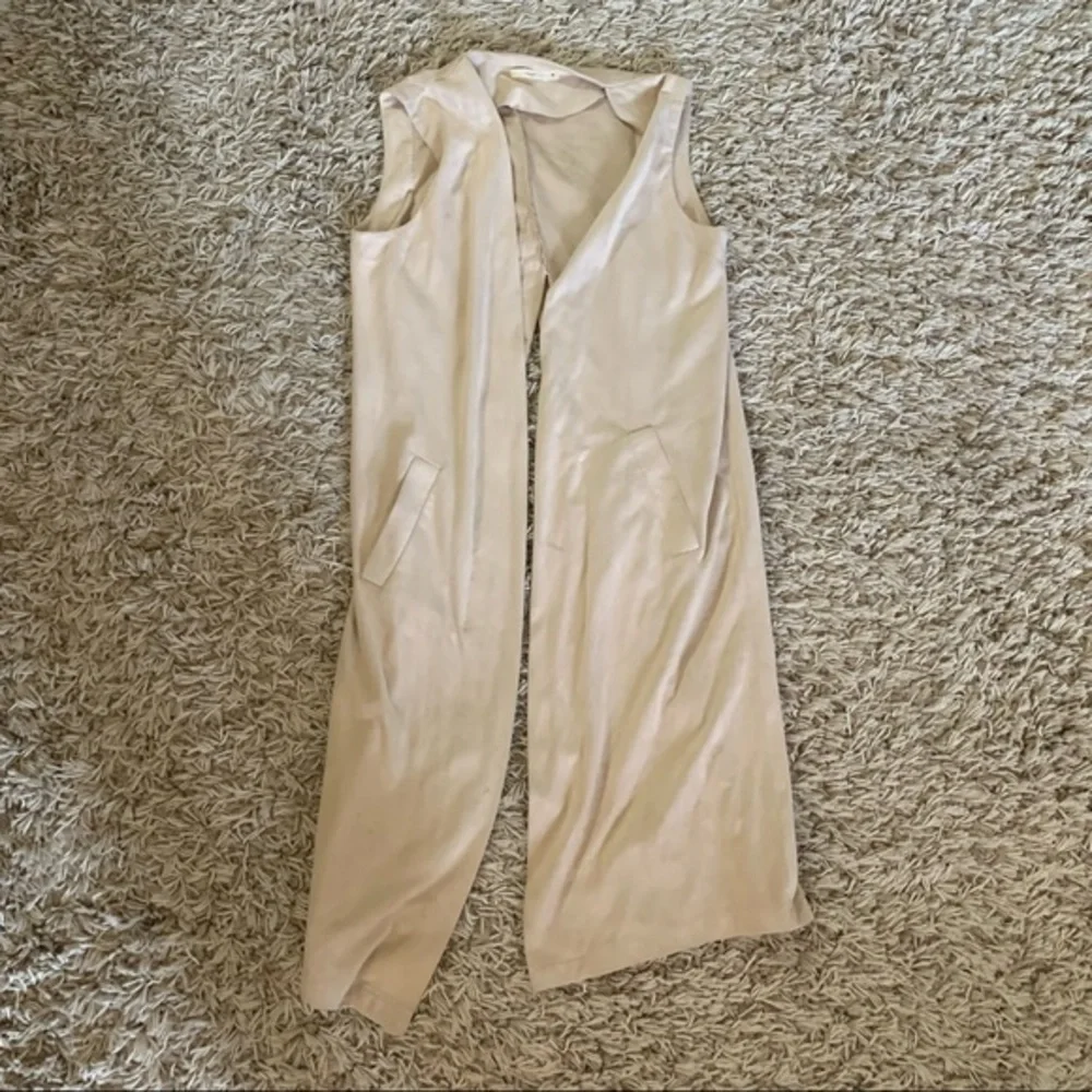 Hazel suede vest with unique open back design • medium